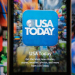 USA Today – iPhone apps window display at Apple Store in San Francisco